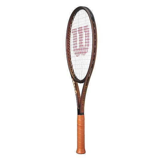Wilson Pro Staff X V14 tennis racket with an elegant Desert Bronze design, a larger sweet spot, and classic Pro Staff feel