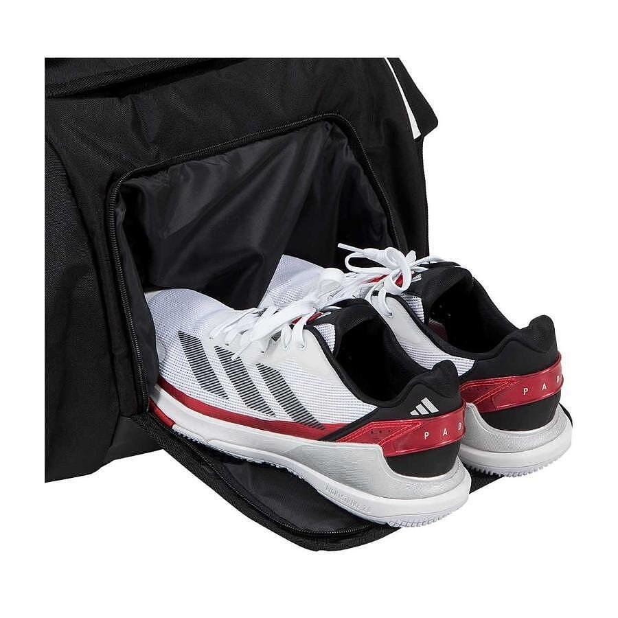 Adidas Protour 3.4 padel backpack in black and blue, with thermal-insulated racket compartments, shoe compartment, and adjustable padded straps, 70-liter capacity