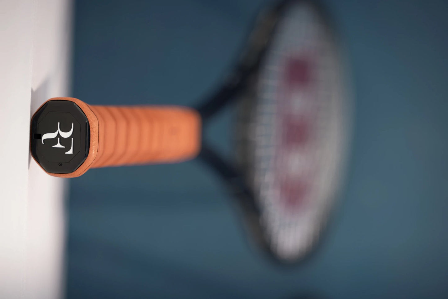 Wilson RF 01 16x19 tennis racket with an orange grip for precise control and all-around play